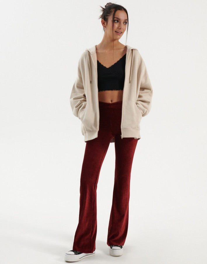 Pantaloni evazați din imitație de catifea reiată roșie